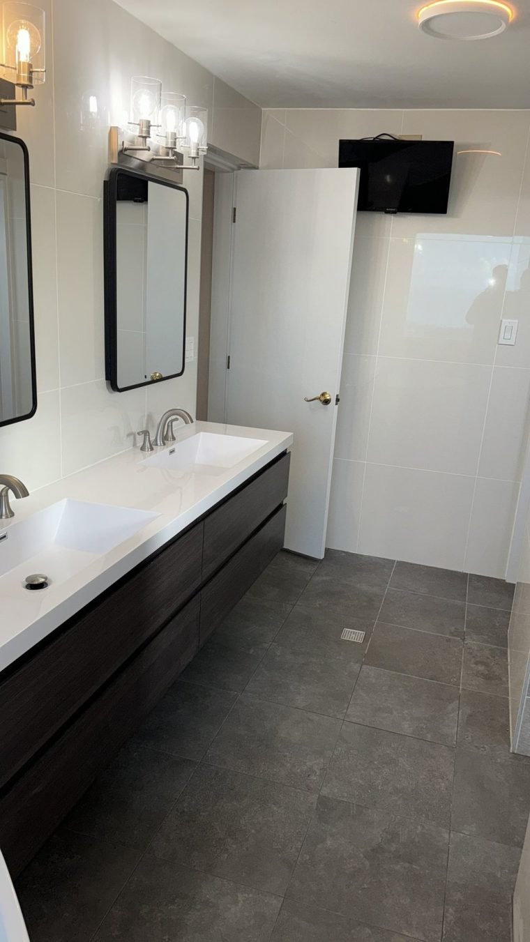 A 7' × 15' view bathroom, rebuilt sleek and understated.